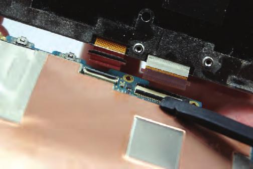 Step 10 There is a ribbon cable secured in a locking socket on the bottom of the phone.
