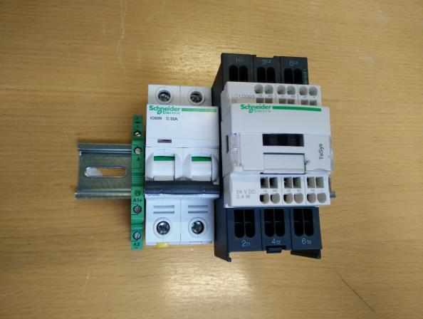 In the package there is included a DIN rail to mount the optocoupler, fuse and the relay on. An example is shown on the picture above mounted in that order from left to right.
