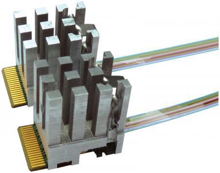 Figure 2 Samtec FireFly optical modules, each interfacing 12 gigabit serial copper signals to 12 optical