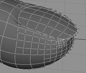 Lesson 1 > Creating a crease in a subdivision surface (Shading > Wireframe).