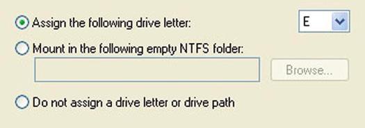 ➇ If you like, you can specify the drive letter designation for your new drive. Otherwise, one will automatically be assigned. Click Next.