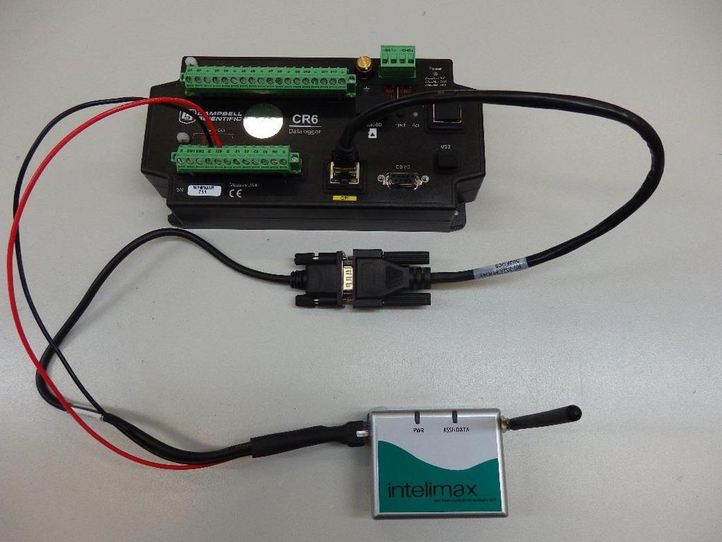 9.6 Connection via CPI Port FIGURE 9-8 CR6 Data Logger With the addition of a 31056 CPI-RS-232 adaptor, connection of the CR6 to the DCP-INTELIMAX-RS232 is identical to that described in Section 9.