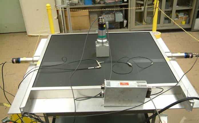 Using a Na-22 source, the uniformity of the actual 1x1 meter plastic slab, shown in Figure 2, was measured. The anode signals of the opposing PMTs were matched for timing and gain and then summed.