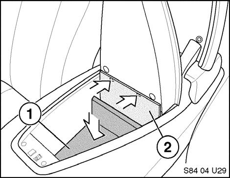 15 For Vehicles Produced Before 09/05: 10. Attach trim panel P/N 51 16 7 113 150 (2) to bottom of eject box housing by pushing two pivot tabs located on top portion into the slots in housing.