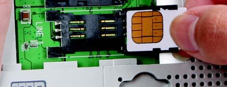 SIM Card Installation Two SIM cards are required for a 2-line configuration. To install a SIM card, follow these steps: 1. Slide the SIM card cover down, then lift off. 2. Gently slide up the SIM card holder.