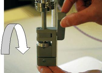 5. To engage the shorting disc, turn bottom lever forward, left and around until