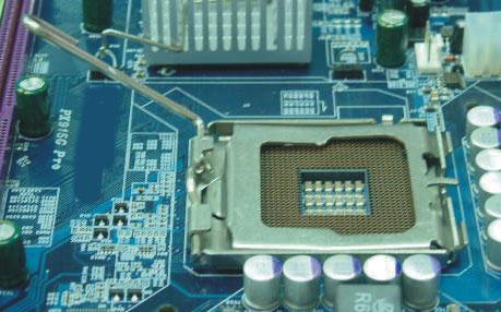 Match these marks with the marks on the CPU and carefully lower the CPU down onto the socket (D). 3.