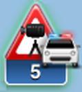 The alert symbol has a green background border when you are driving at or slower than the speed limit and a red background border when you are driving faster