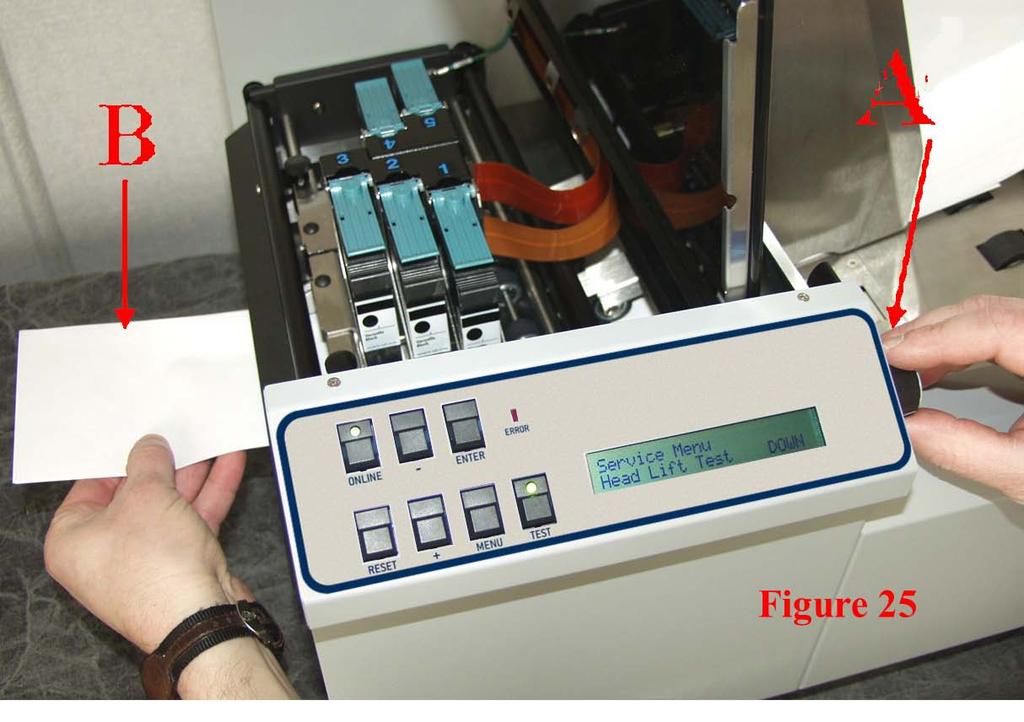 Slowly adjust the Media Thickness Dial [A] counter-clockwise until the printhead carriage rollers touch and hold the Media [B] securely. Figure 24 6.