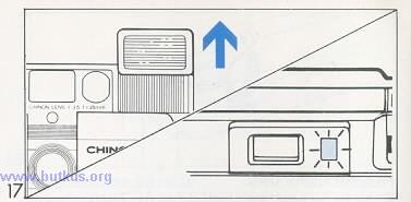 When the film has been completely rewound, the tension of the Film Rewind Crank is released and it will revolve freely (Fig. 15). 3. Slide down the back Cover Release Button to open the camera back.