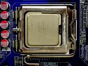 Align the CPU pin one marking (triangle) with the pin one corner of the CPU socket (or you may
