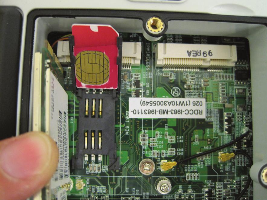 the left and open the SIM card holder.