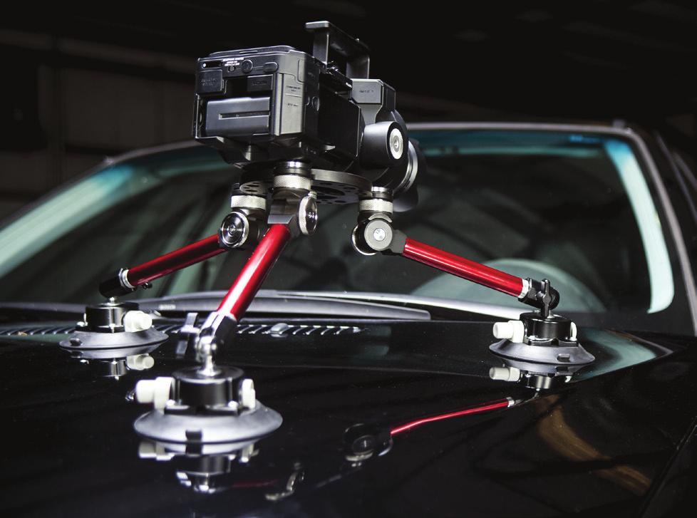 User s Guide 34 Using the System (continued) Mounting the to your vehicle (continued) 2) Mount the : Construct your custom configuration by attaching three legs to the suction cup mounts at one end