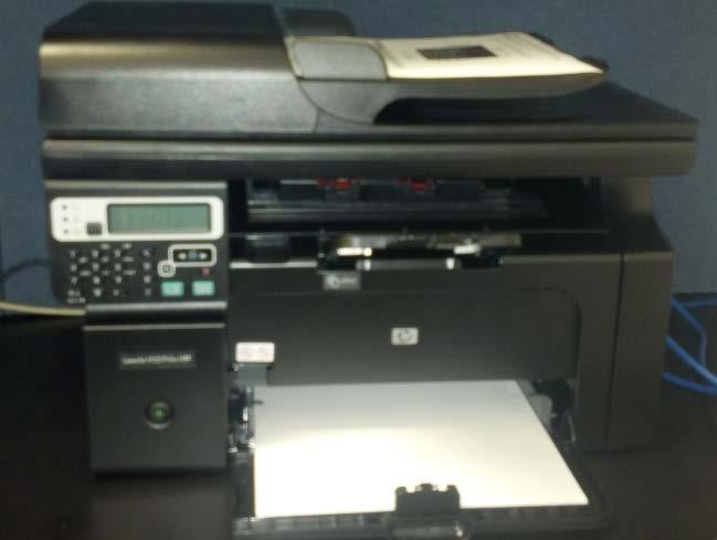 USING THE SCANNER AT THE ESS WORKSTATION Requirement: the scanner looks like