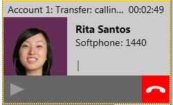 Transfer button The call is put on hold and a call entry field appears.