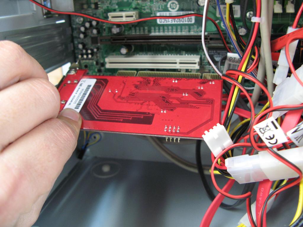 Remove the cover and locate the available PCI slot that you would like to use.