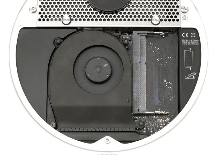 Remove the bottom cover of your Mac mini, exposing the memory access bay.