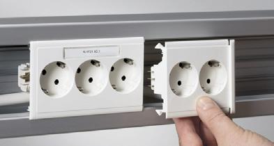 The combination is ended by an end piece, which is easily pushed in between the side of the outlet and the front cover. Marking, termination and strain relief are done on the master socket outlet.