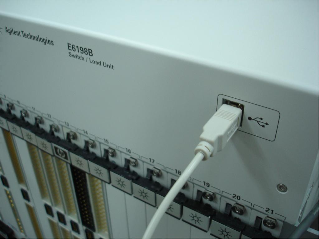 4 Configuring the Switch/Load Unit Connecting E6198B to the Computer via USB Interface or Parallel Port USB interface is introduced in E6198B, on top of parallel port interface which is available