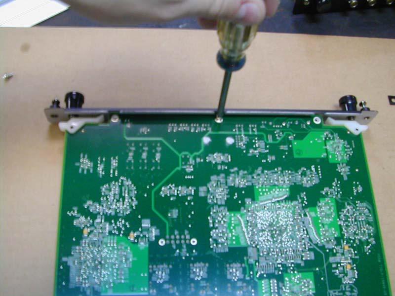 12. Place the protective covering on the board, making sure to line up