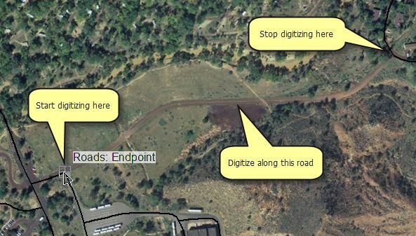 Digitizing a line Steps: 1. You are now ready to begin digitizing the new road. In the Create Features window, click the Local road line template, which is grouped under Roads.
