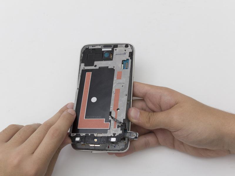 Press firmly on corners of the midframe while holding on to the plastic bezel (the outer plastic