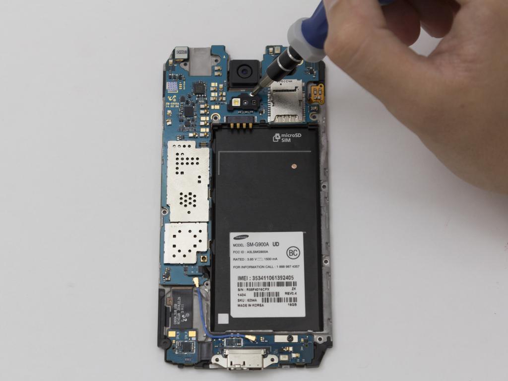 When putting the phone back together, insert the bottom first by inserting the charging port into