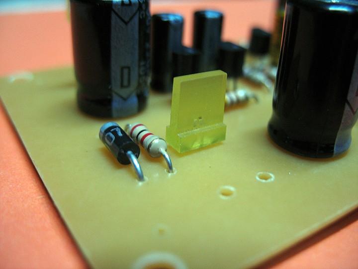 Next, insert the power indicator LED2, and the rest of the capacitors.