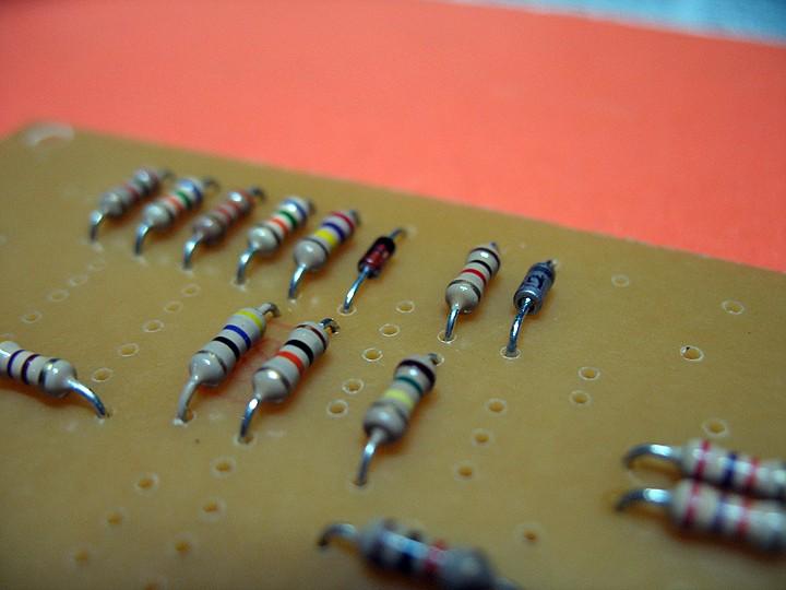 Start populating your board with the resistors first.