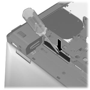 Insert a screw driver or similar thin tool into the keyboard release hole, and then press on the back of the