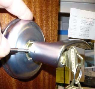 B: Install Mechanical Key Override in ILS Locks c. Insert the Handle with the Cylinder into the Handle Shaft.