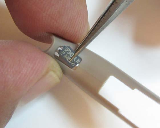 tweezer Place the side of the ID plate with one prong and