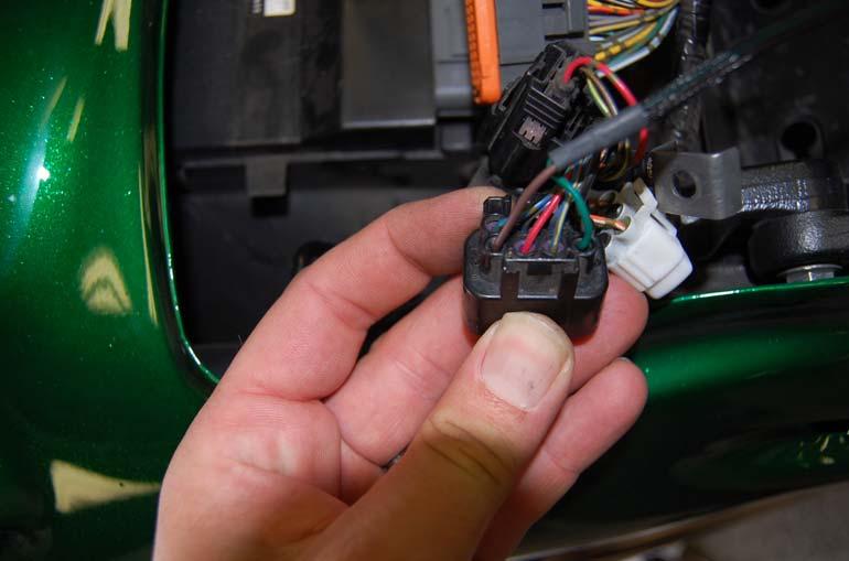 With brown and blue wires in place, place the yellow cap back in the connector, it may be necessary to take a small