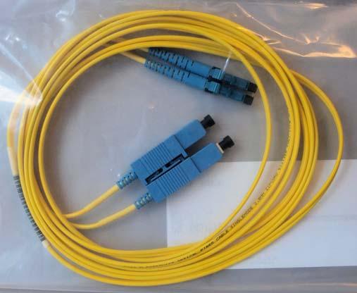 A Single Mode LX transceiver uses yellow colored fiber optic cable.