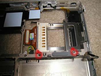 PCMCIA Card Cage Replacement Before proceeding, you must first remove: Battery Keyboard Bottom Case Airport Card (If
