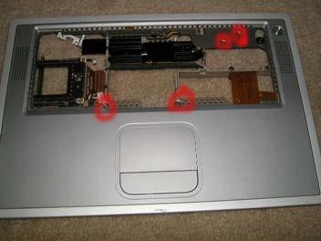 Board PCMCIA Card Cage Remove the 4 Torx T6 Screws near the ports as