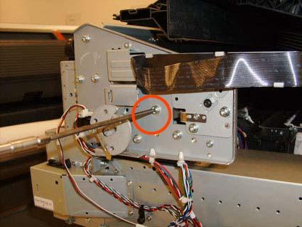 23. Loosen the T-15 screw Belt Tensioner to the printer to remove