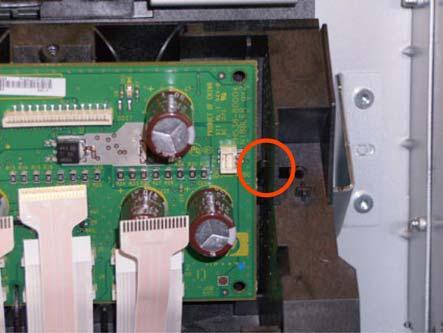 12. Remove the cover on each side of the Carriage PCA using a screwdriver unclip it. Removal and 13.