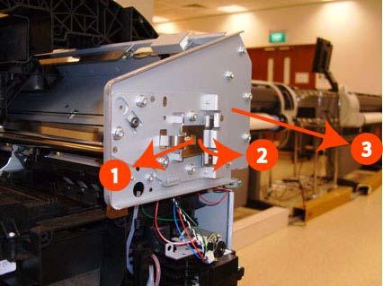 9. Unclip the Encoder Strip tensioner from the right hand end and pull the encoder strip straight out.