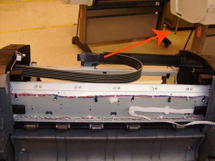 9. Remove the Ink Supply Tubes Support Rail from the printer.
