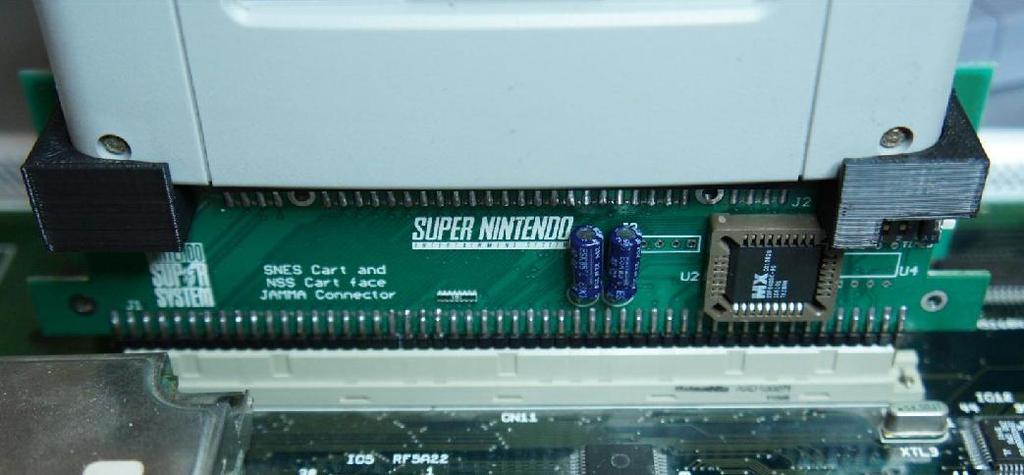 Brackets are provided for SNES (left) and SFC (right) cartridges.