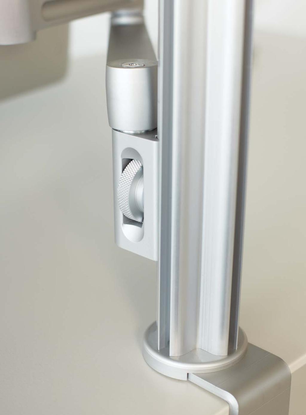 A SLEEK WIRE MANAGEMENT COLUMN CONCEALS CABLES FROM THE ARM TO THE WORKSURFACE.