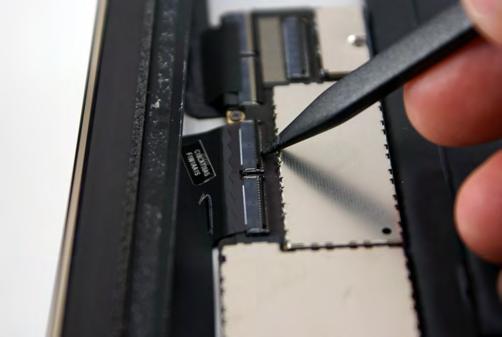 Once the locking tab is flipped upward 90 degrees, slide the ribbon cable out from its connector. This will allow you to remove the LCD screen from the ipad 4.
