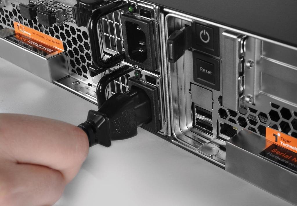 Tiger Serve Assembly Guide Site Installation: Powering On The Appliance To connect the appliance to the power supply: 1. Plug the power cord in the power socket of the power supply module.