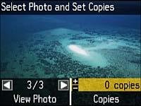 A photo on your memory card is displayed: 4. Press the right and left arrow buttons to scroll through your photos and display one that you want to view or print. 5.