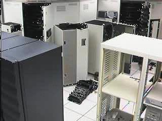 The two STK silos in the PSC machine room at Westinghouse. Two connected silos, 6,000 slots each Tape drives: Originally: 4X4 STK drives Now: 2X4 STK drives, 1X4 IBM Magstar drives.