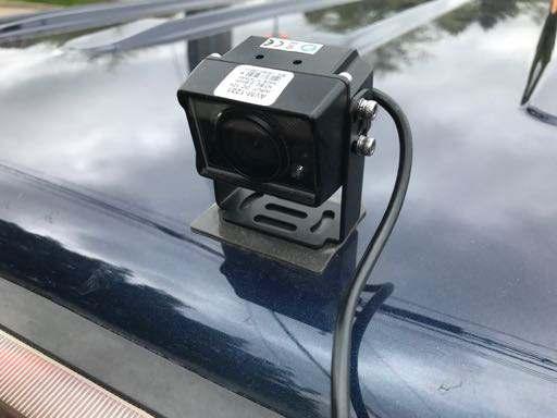 This Camera is placed in the upper corner of the windshield on the passenger side for a driver view.