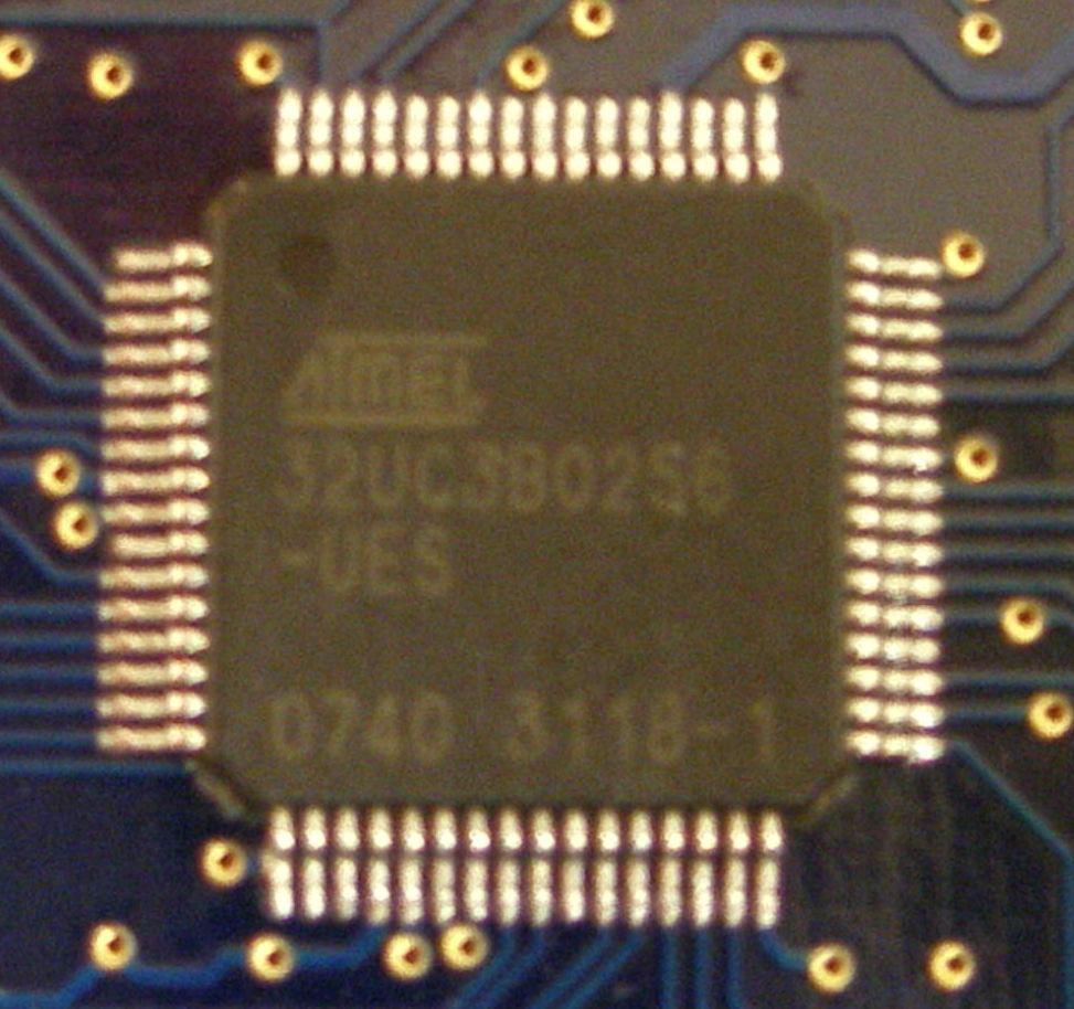 The picture shows the part number printed on an -ES part (-UES suffix). Set Board to EVK1101.
