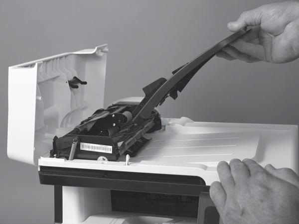 it, and then remove the tray. TIP: Hold down the scanner lid while removing the tray.