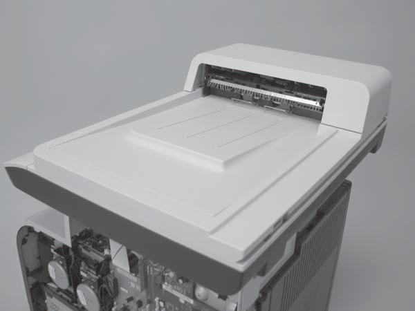 4. Slightly lift up the back of the scanner, and then slide it toward